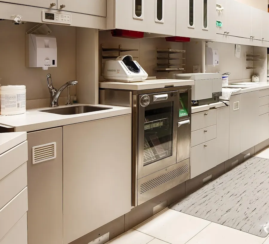 The sterilisation area, with sinks, sterilisers and sealed storage.